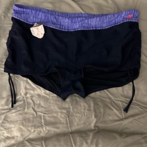 ZeroXposur brand swim shorts with drawstring sides. Size 16
